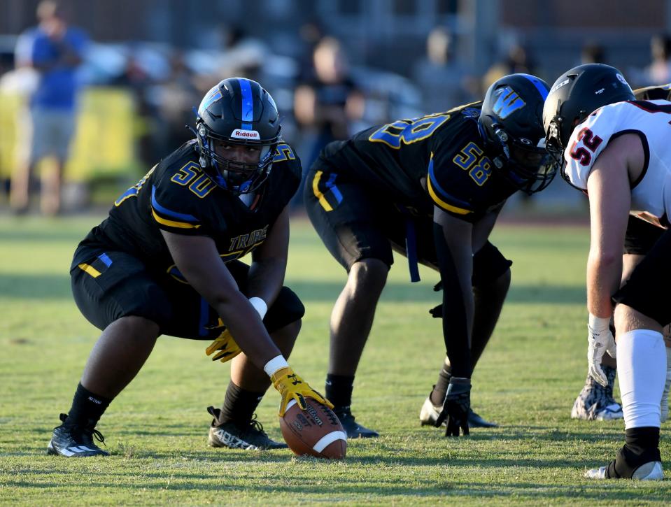 Wi-Hi's Jaden Smalls (5) waits to snap the ball against Linganore Friday, Sept. 1, 2023, in Salisbury, Maryland. Linganore defeated WiHi 40-0 to start the season.