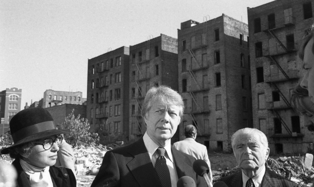 President Jimmy Carter speaks at a press conference along with Mayor Abe Beame, right, and Sec. of Housing and Urban Development Patricia Harris on Oct. 6, 1977, regarding the problems besieging the South Bronx.