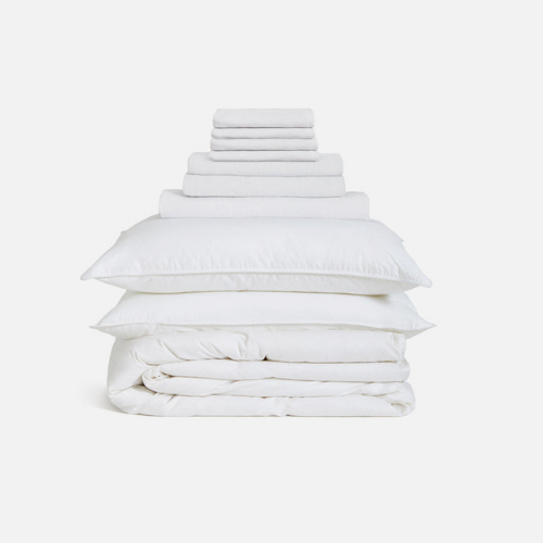 folded white linen sheet set from brooklinen