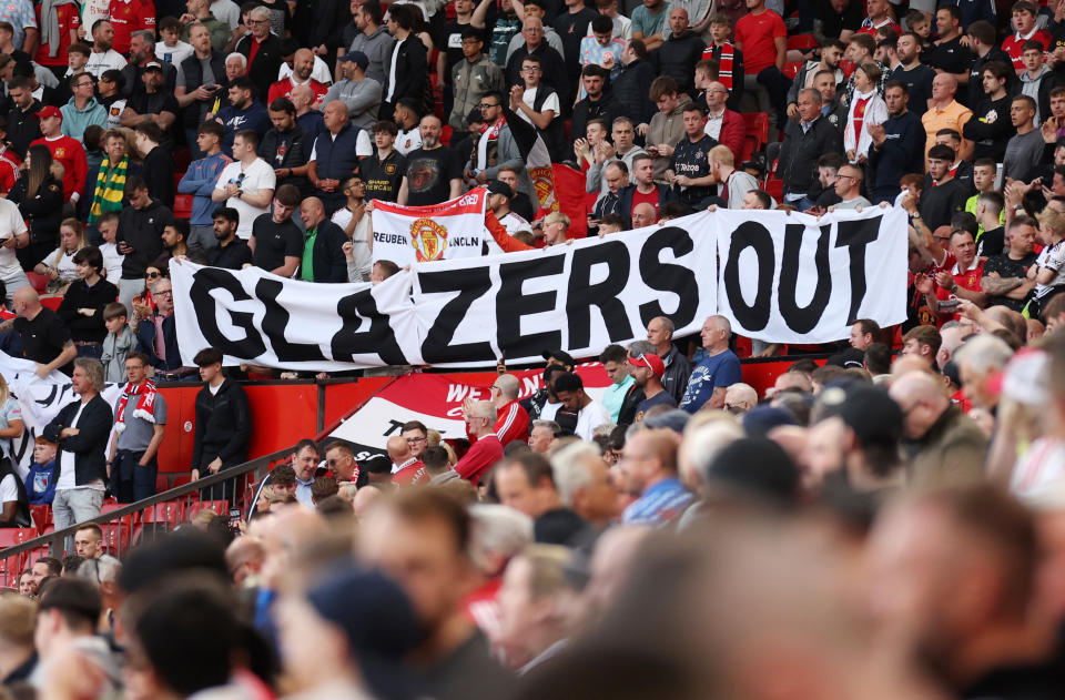 MANCHESTER, ENGLAND - MAY 25: Fans protest against the owners of Manchester united and hold banners which read &#39;Full sale only&#39; and &#39;Glazers Out&#39; prior to the Premier League match between Manchester United and Chelsea FC at Old Trafford on May 25, 2023 in Manchester, England. (Photo by Catherine Ivill/Getty Images