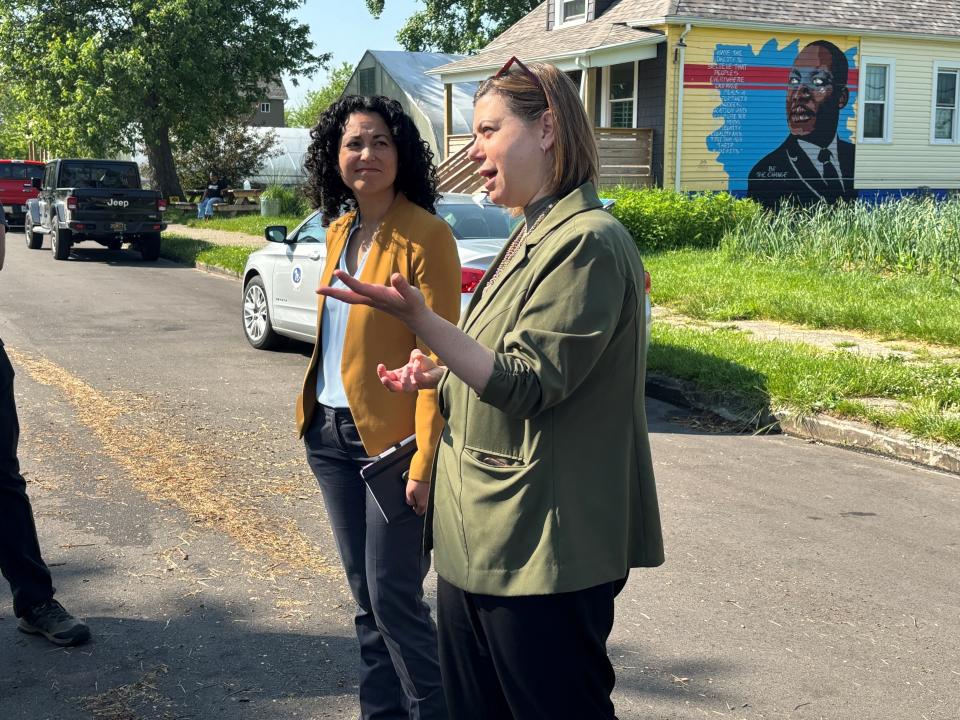 Xochitl Torres Small (L), Deputy Secretary of the USDA and U.S. Rep. Elissa Slotkin (R), D-Lansing meet with urban farmers and at Oakland Avenue Urban Farm in Detroit's North End.