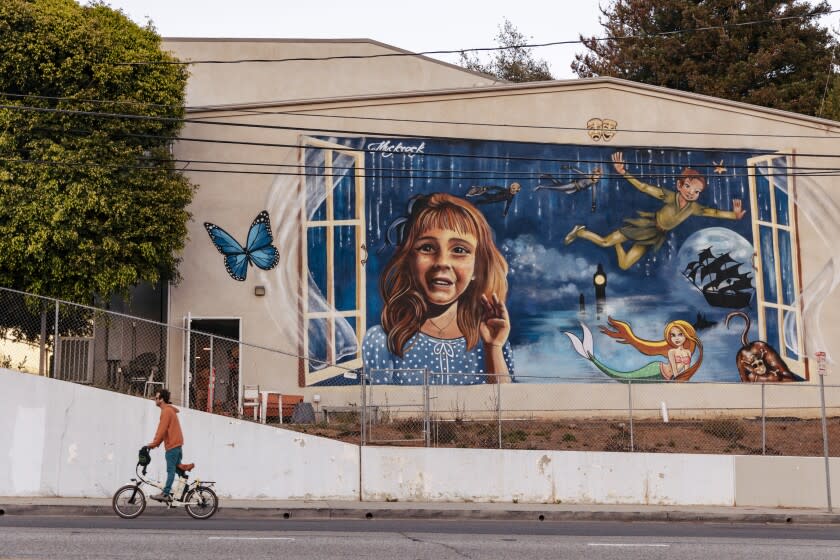 Pacific Palisades, CA - August 02: A mural dedicated to Molly Steinsapir, a 12-year-old girl who died in an e-bike crash, is seen on the exterior of the Pierson Playhouse on Tuesday, Aug. 2, 2022 in Pacific Palisades, CA. (Wesley Lapointe / Los Angeles Times)