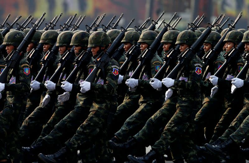 FILE PHOTO: Soldiers march during the annual Military Parade to celebrate the Coronation of King Rama X at the Royal Thai Army Cavalry Center in Saraburi province