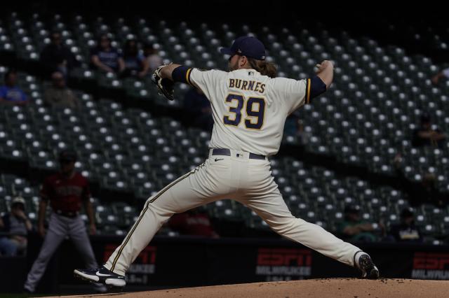 MILWAUKEE - JULY 27: Craig Counsell #4 of the Arizona Diamondbacks stands  at the plate ready for the pitch during the game against the Milwaukee  Brewers at Miller Park on July 27