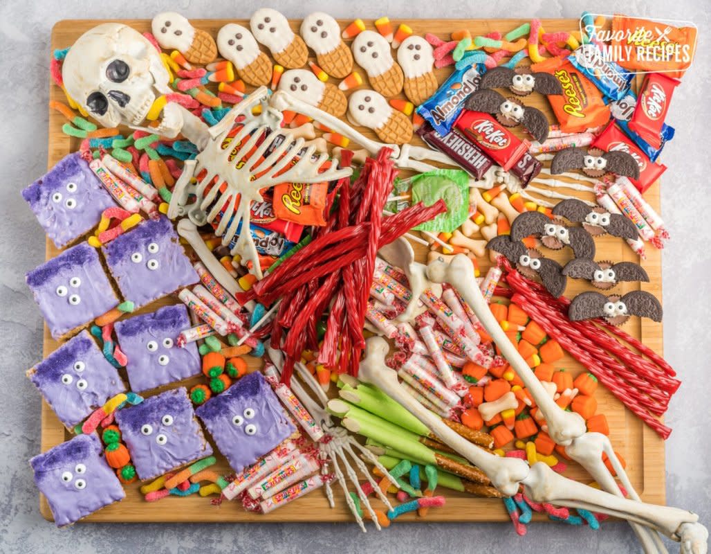 <p>Favorite Family Recipes</p><p>The biggest candy holiday of the year needs a special holiday board with a fun, dressed-up treat tray like this one! You will be a hit with the kiddos as they indulge in way too much candy.</p><p><strong>Get the recipe: </strong><a href="https://www.favfamilyrecipes.com/halloween-charcuterie-board/" rel="nofollow noopener" target="_blank" data-ylk="slk:Halloween Charcuterie Board;elm:context_link;itc:0;sec:content-canvas" class="link rapid-noclick-resp"><strong>Halloween Charcuterie Board</strong></a></p>