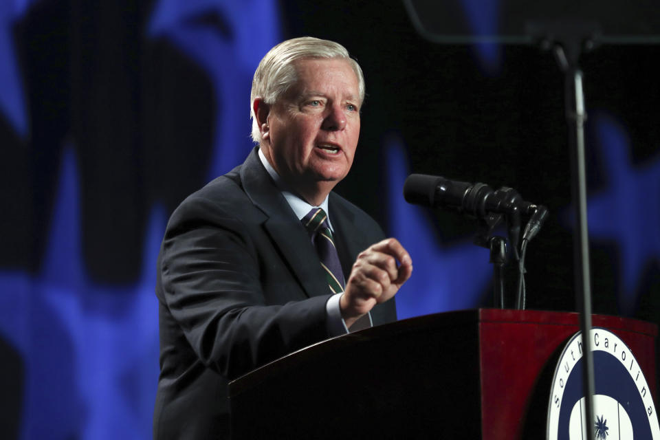 FILE - Sen. Lindsey Graham, R-S.C., speaks during the 56th annual Silver Elephant Gala in Columbia, S.C., Saturday, Aug. 5, 2023. A report released on Friday, Sept. 8, revealed that a special grand jury investigating efforts to overturn Georgia’s 2020 presidential election results recommended indictments against a much larger group than Fulton County District Attorney Fani Willis ultimately charged, including one current and two former U.S. senators. The names of those not indicted included Sen. Lindsey Graham, R-Ga., former U.S. Sens. Kelly Loeffler and David Perdue of Georgia and former Donald Trump national security adviser Michael Flynn. (AP Photo/Artie Walker Jr., File)