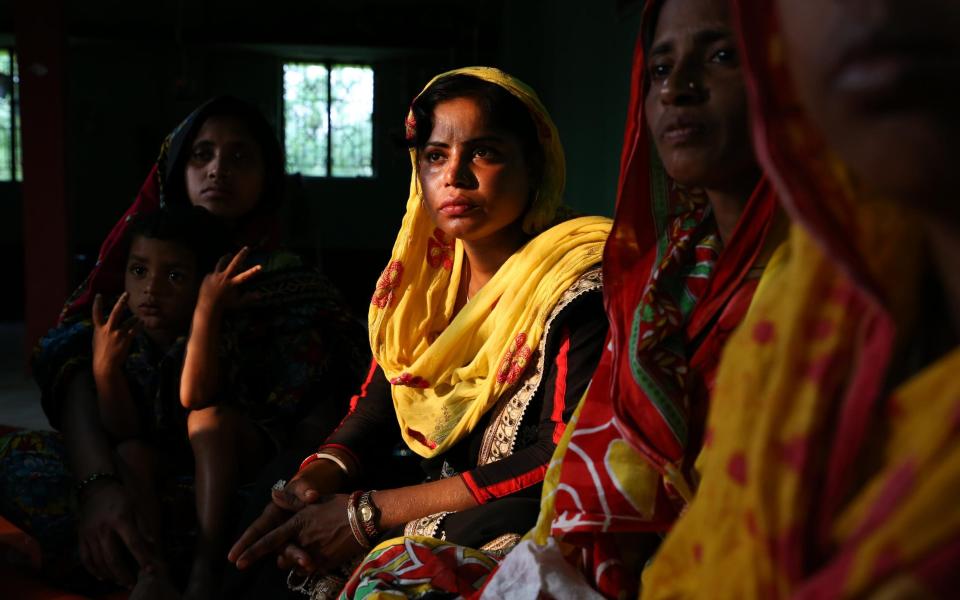 Members of Bandhan Mukti, a trafficking survivors collective, attend a meeting to learn about economic empowerment in Goran Bose, West Bengal - Catherine Davison