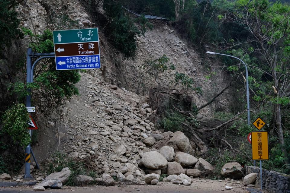 Fallen rocks and debris block a vehicle passage near the Taroko National Park, following earthquake (EPA)