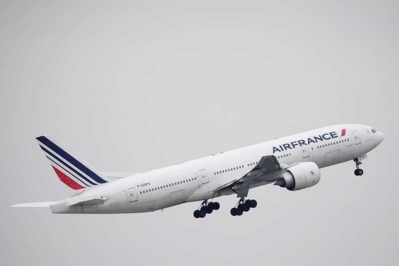 FILE PHOTO: An Air France Boeing 777 aircraft takes off at Paris Charles de Gaulle airport, following the coronavirus disease (COVID-19) outbreak, in Roissy-en-France