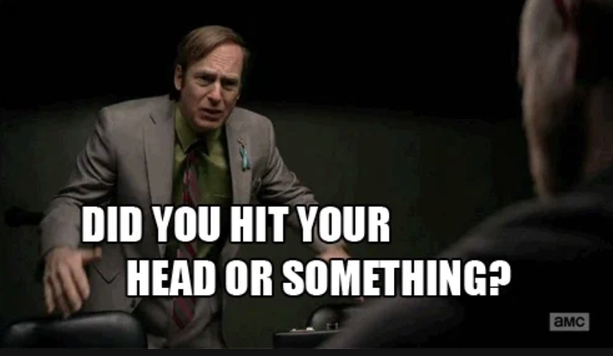 Bob Odenkirk, in a suit and tie, from a scene in AMC's show, gestures while saying, "Did you hit your head or something?"