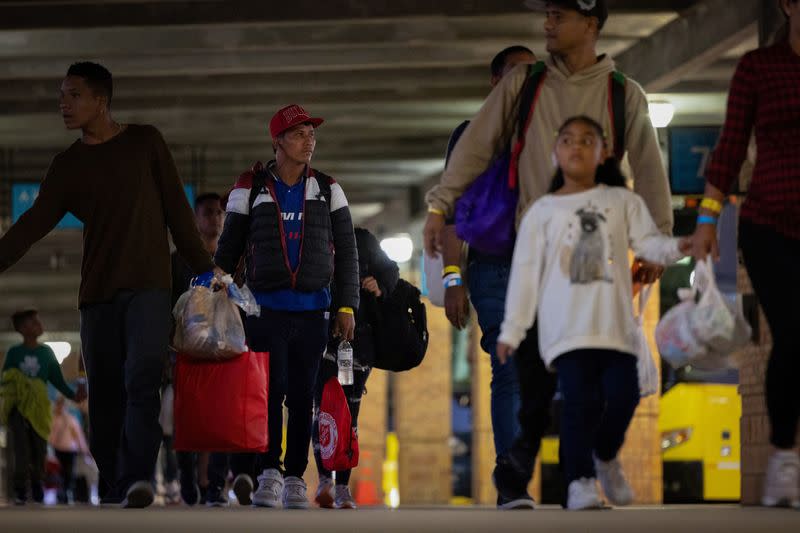 The Wider Image: The toll on migrants of a free bus north from the border