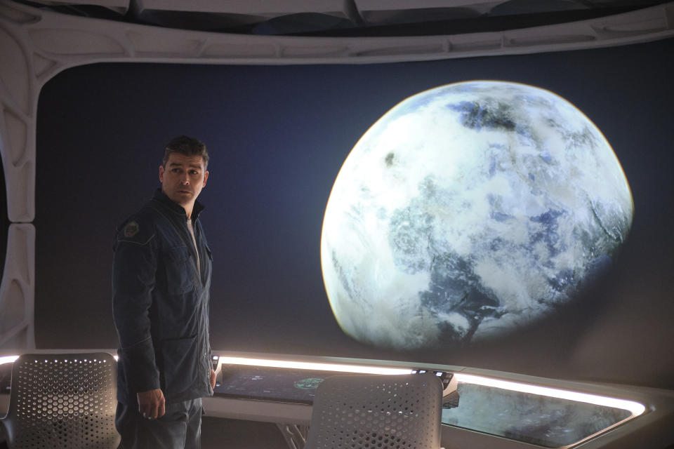 This image released by Netflix shows Kyle Chandler in a scene from "The Midnight Sky." (Philippe Antonello/Netflix via AP)