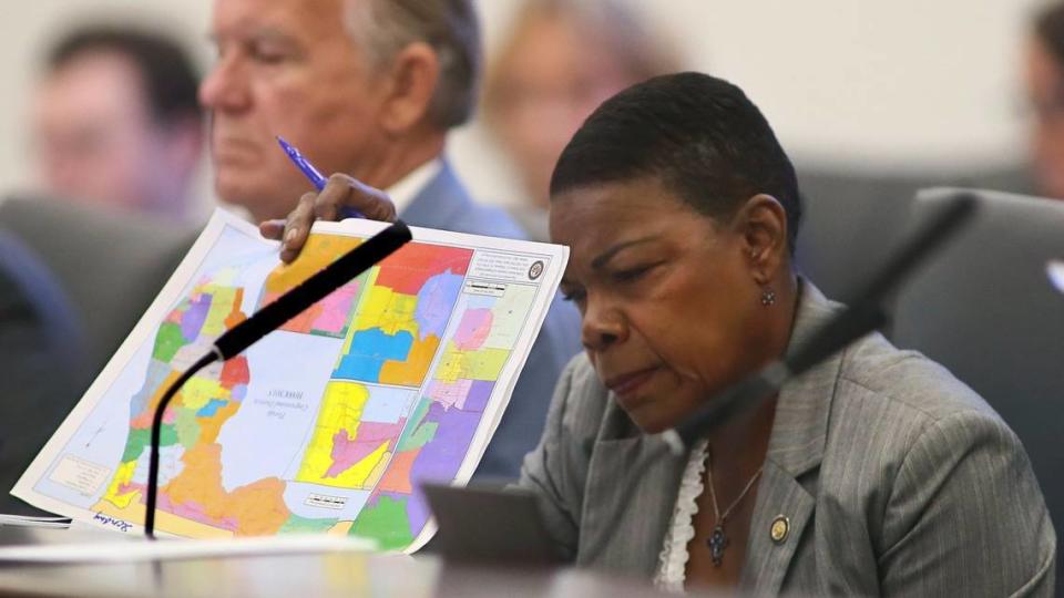 State Sen. Audrey Gibson, D-Jacksonville, reviews proposed congressional district maps during a Committee on Reapportionment meeting on April 19 in Tallahassee.