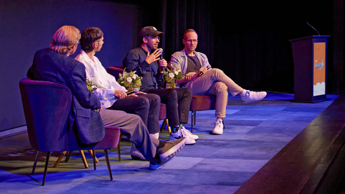  AI, AI art and filmmaking; four men on a stage at the SCAD Animation Fest in Atlanta. 