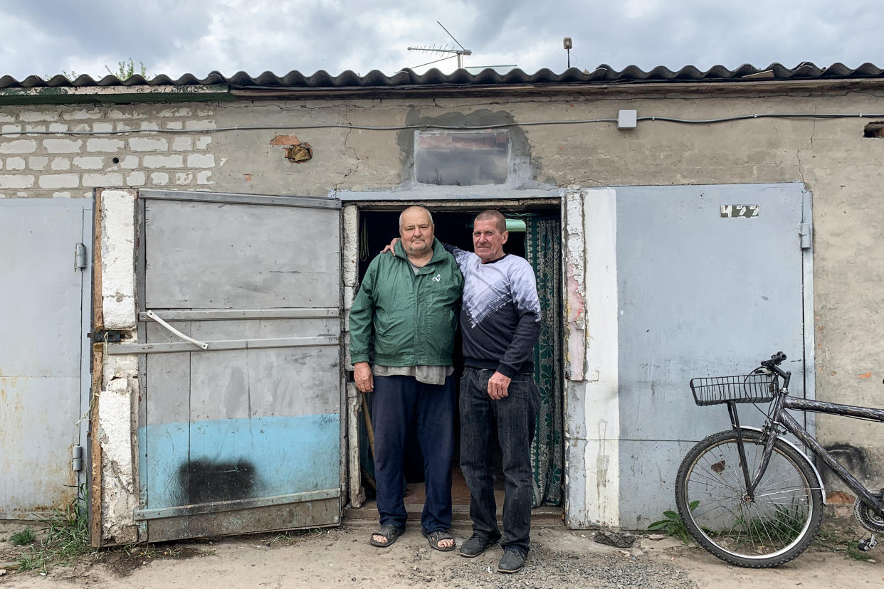 Serhiy Griva and Anataoliy Dvorak live in a storage unit. (Lauren Egan / NBC News)