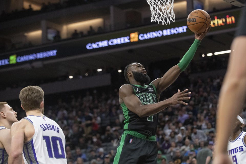 Boston Celtics guard Jaylen Brown lays the ball up during the first quarter of the team's NBA basketball game against the Sacramento Kings in Sacramento, Calif., Friday, March 18, 2022. (AP Photo/Randall Benton)