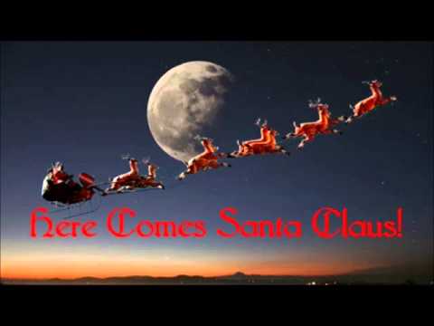 "Here Comes Santa Claus," Gene Autry