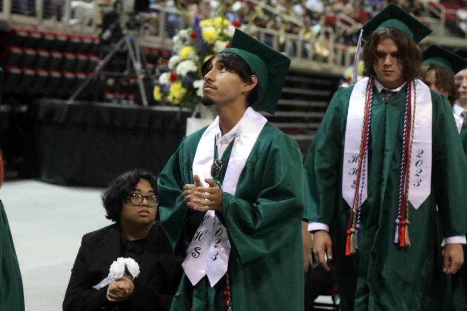 A graduate during the Hoover High graduation ceremony held at the Save Mart Center on June 6, 2023.