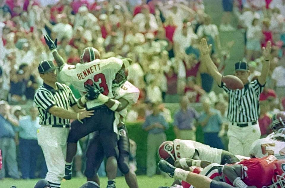 South Carolina running back Brandon Bennett celebrates after his game-winning touchdown leap against Georgia in their 1993 classic game in Athens.