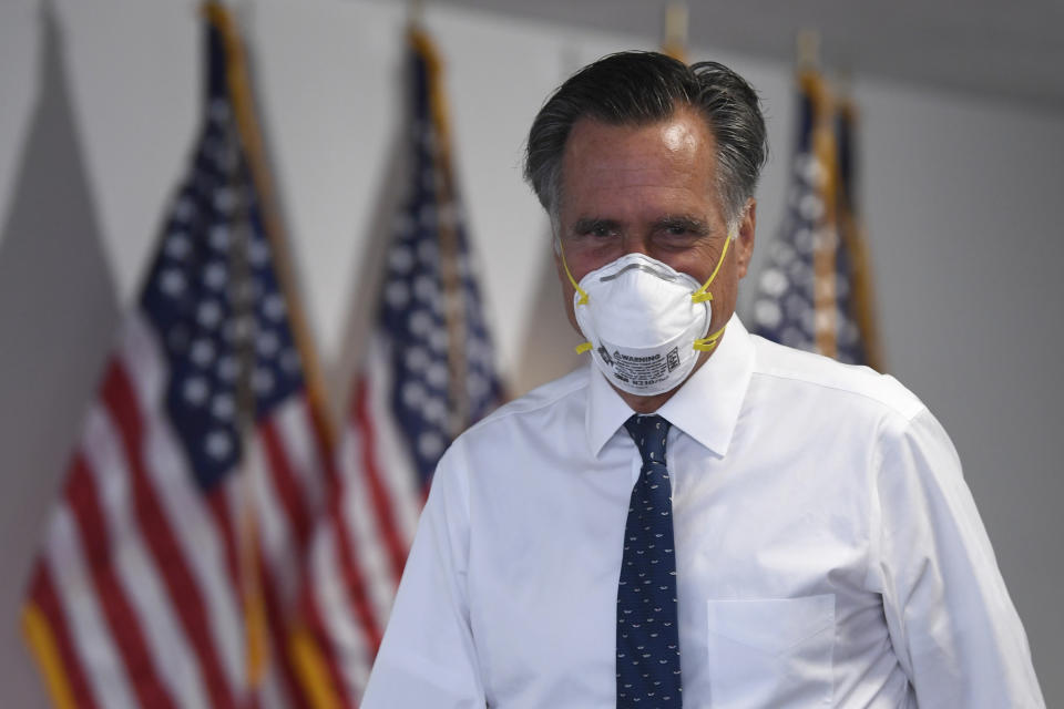 Sen. Mitt Romney, R-Utah, leaves a Republican luncheon on Capitol Hill in Washington, Thursday, June 4, 2020. (AP Photo/Susan Walsh)