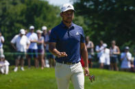 Xander Schauffele reacts after a putt on the fourth hole during the third round of the Travelers Championship golf tournament at TPC River Highlands, Saturday, June 25, 2022, in Cromwell, Conn. (AP Photo/Seth Wenig)