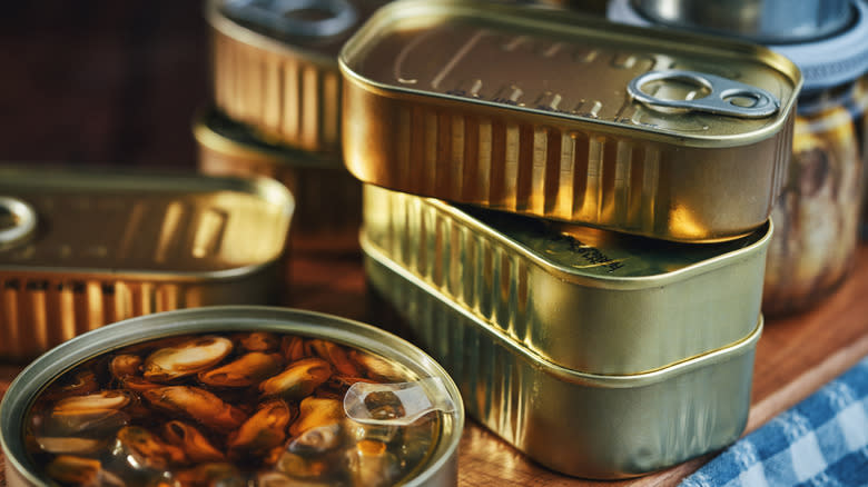 stacked cans of tinned fish