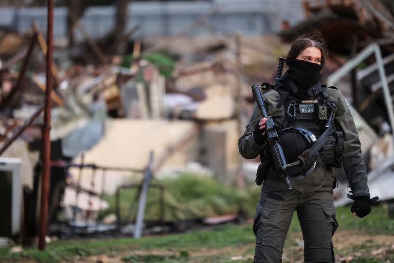 A member of the Israeli border police stands guard at the site of a demolished house in the Sheikh Jarrah neighbourhood of East Jerusalem
