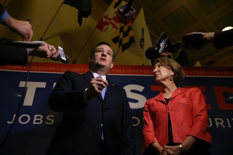 Republican presidential candidate Ted Cruz and his running mate, former Hewlett-Packard chief executive Carly Fiorina, speak with the media on April 29, 2016 in Indianapolis, Indiana