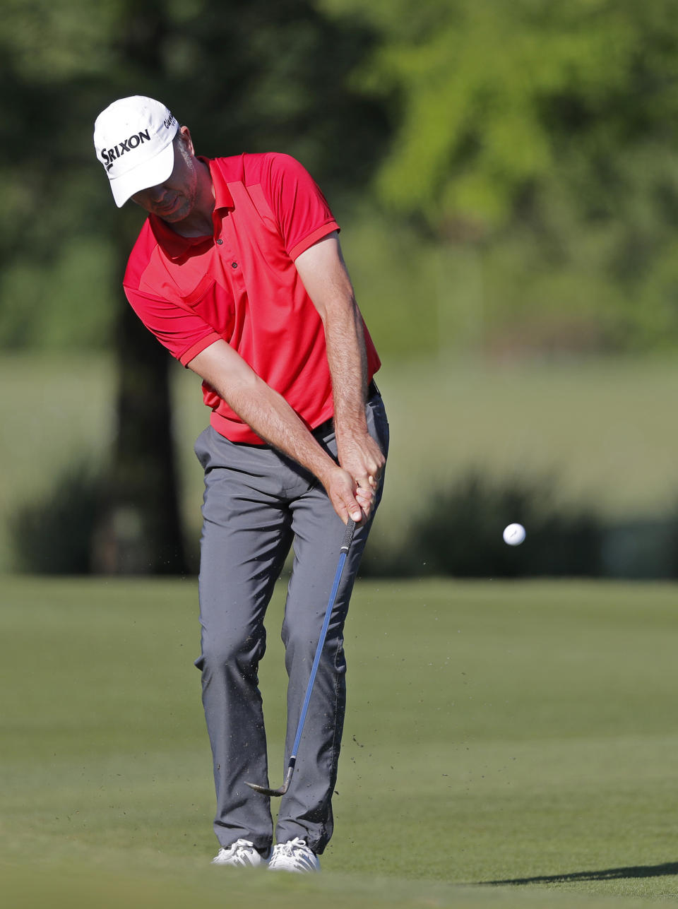 Martin Laird chips onto the first fairway during the first round of the PGA Zurich Classic golf tournament at TPC Louisiana in Avondale, La., Thursday, April 25, 2019. (AP Photo/Gerald Herbert)