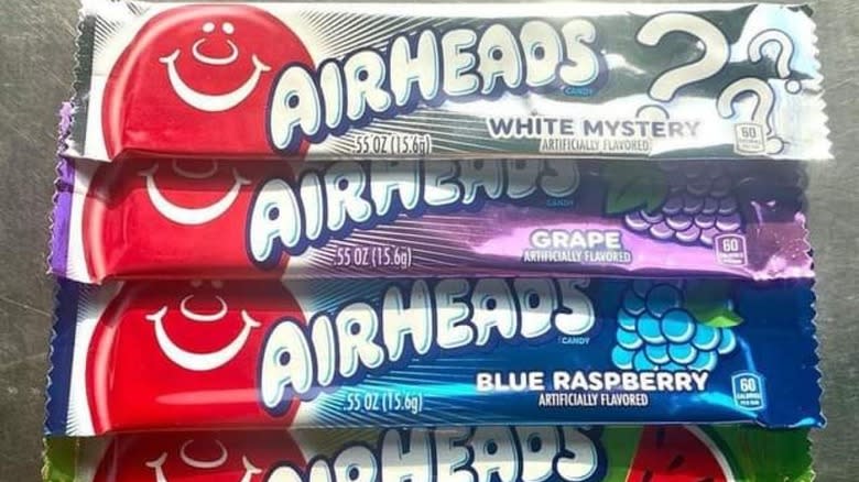 white, grape, and blue raspberry Airheads