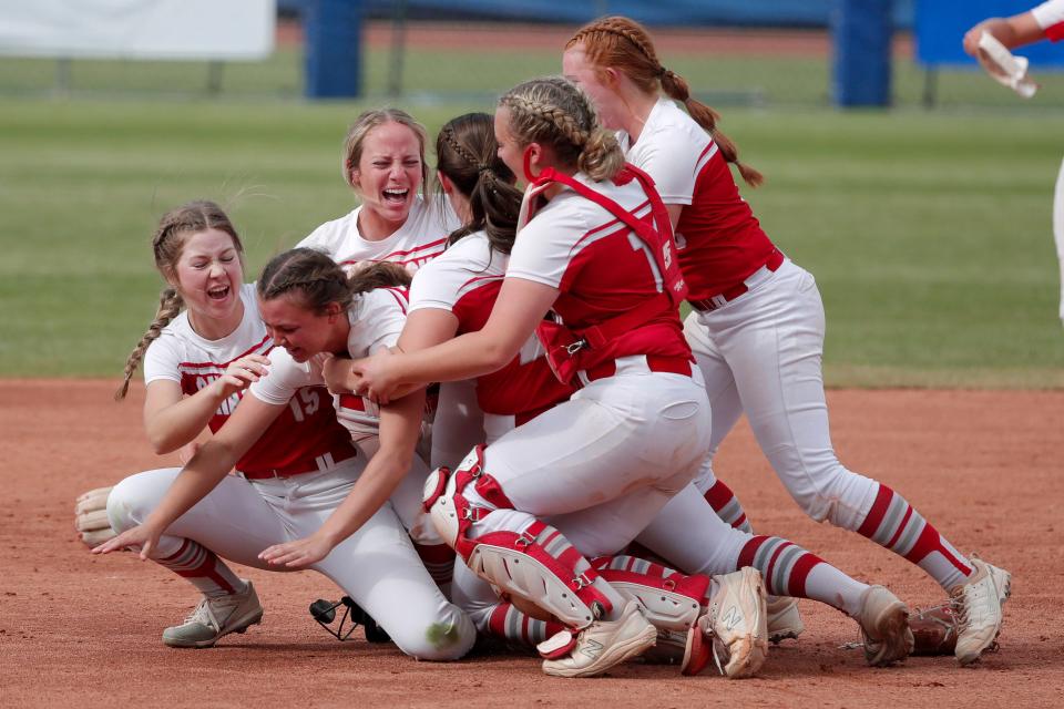 Shattuck celebrates after beating Canute for the Class 2A slowpitch softball state championship on Wednesday at USA Hall of Fame Stadium.