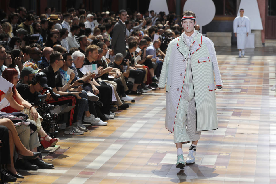 A model wears a creation for the Thom Browne mens Spring-Summer 2020 fashion collection presented in Paris, Saturday, June 22 2019. (AP Photo/Michel Euler)