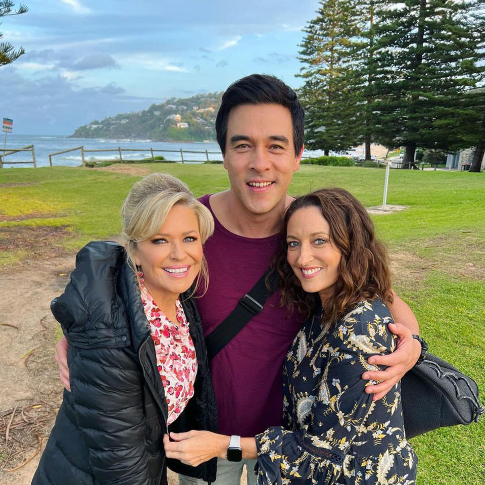 Georgie Parker, Emily Symons and James Stewart smile at the camera while on location at Palm Beach