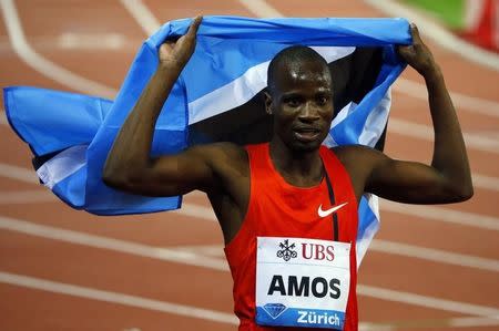 Nijel Amos of Botswana celebrates winning the men's 800 metres event during the Weltklasse Diamond League meeting at the Letzigrund stadium in Zurich August 28, 2014. REUTERS/Arnd Wiegmann