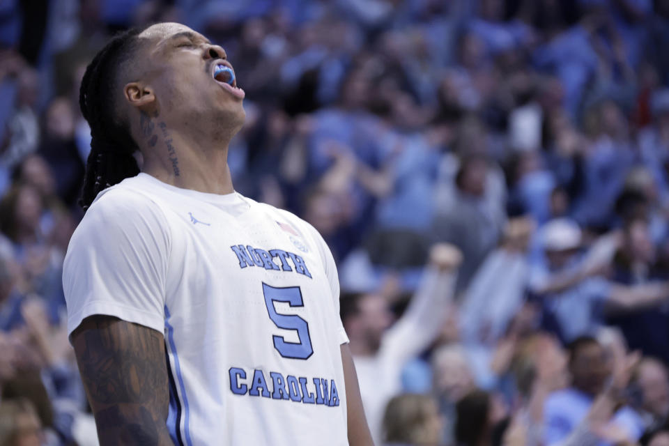 North Carolina forward Armando Bacot (5) celebrates the win over Duke as time runs out at the end of an NCAA college basketball game Saturday, Feb. 3, 2024, in Chapel Hill, N.C. (AP Photo/Chris Seward)