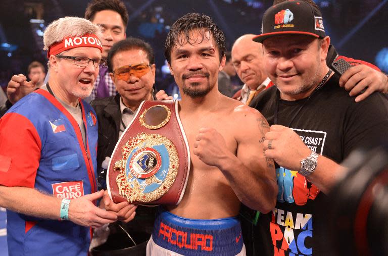Manny Pacquiao of Philippines celebrates victory over Timothy Bradley of US following their WBO World Welterweight Championship title match at the MGM Grand Arena in Las Vegas, Nevada on April 12, 2014