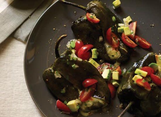 This lighter take on chiles rellenos cuts out the deep-frying and the heavy sauce. Instead it features a filling of sauteed vegetables and cheese and a fresh salsa topping.    <strong><a href="http://www.huffingtonpost.com/2011/10/27/chiles-rellenos-with-toma_n_1058307.html" target="_hplink">Get the Recipe for Chiles Rellenos with Tomato and Avocado Salsa</a></strong>        