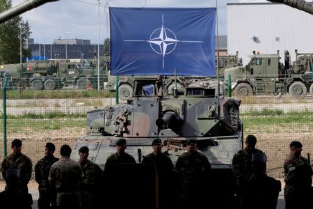 FILE PHOTO: NATO eFP battle group soldiers wait for NATO Secretary General Jens Stoltenberg visit in Tapa military base, Estonia September 6, 2017. REUTERS/Ints Kalnins