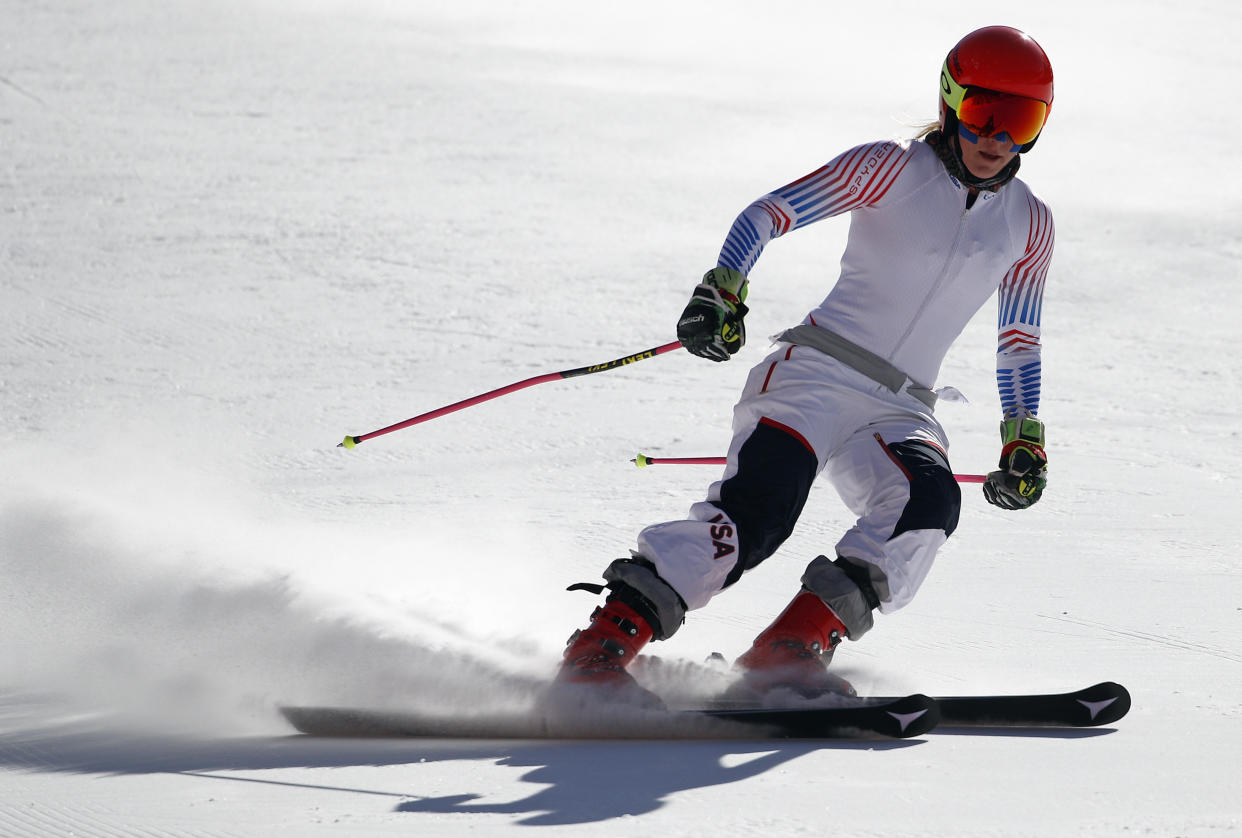Mikaela Shiffrin will have to wait until Friday to ski the slalom, her best event. (AP Photo/Christophe Ena)