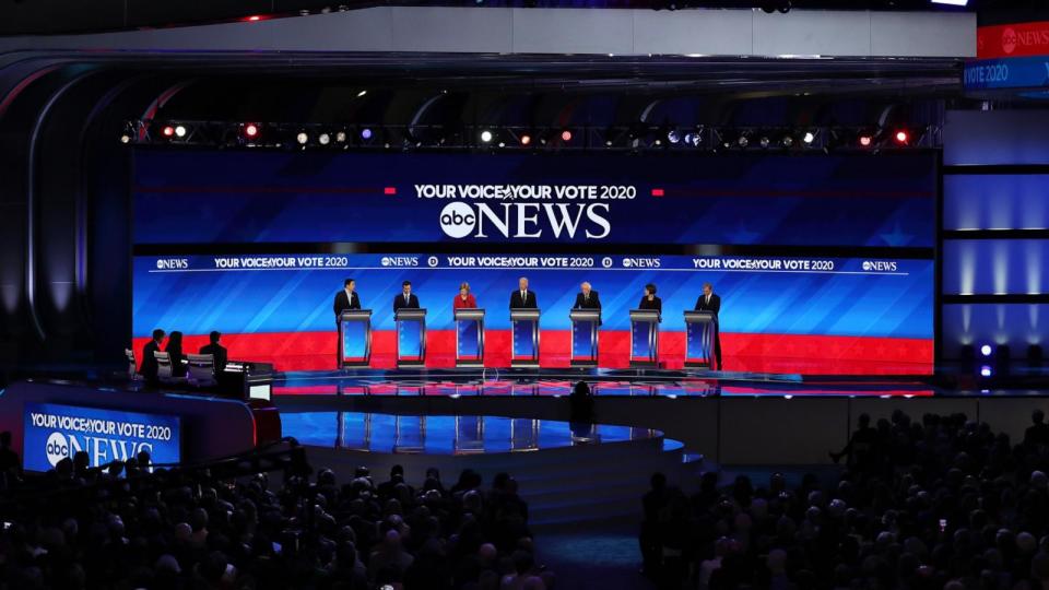 PHOTO: Democratic presidential candidates Yang, Buttigieg, Sanders (I-VT), Biden, Warren (D-MA). Klobuchar (D-MN), and Steyer participate in the presidential primary debate in the Sullivan Arena at St. Anselm College on Feb. 07, 2020 in Manchester, N. H. (Joe Raedle/Getty Images)