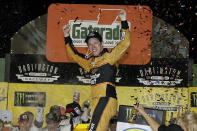 FILE - In this Sept. 2, 2018, file photo, Brad Keselowski celebrates in Victory Lane after winning the NASCAR Cup Series auto race at Darlington Raceway, in Darlington, S.C. Keselowski can't wait to get to Darlington Raceway _ and it's not just because he swept race weekend the last time NASCAR's best showed up. This the fifth year the Southern 500 is NASCAR's throwback weekend, kind of an Old Timer's Day for fans and competitors to honor and mimic the greats of the past.(AP Photo/Terry Renna, File)