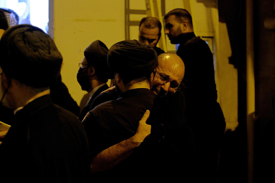 Mourners mourn outside the house of Grand Ayatollah Sayyid Mohammed Saeed al-Hakim in Najaf, Iraq, Friday, Sept. 3, 2021. Mohammed Saeed al-Hakim, one of Iraq's most senior and influential Muslim Shiite clerics, has died, members of his family said. He was 85. (AP Photo/Anmar Khalil)