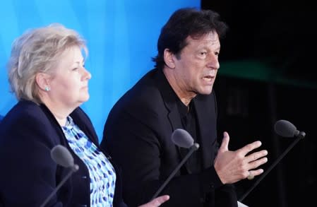 Pakistan's Prime Minister Khan speaks next to Norway's Prime Minister Solberg during the 2019 United Nations Climate Action Summit at U.N. headquarters in New York City, New York, U.S.