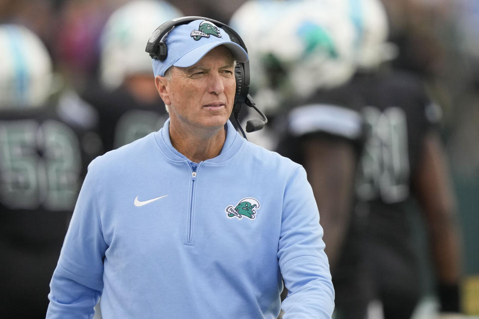 Tulane head coach Willie Fritz walks on the sideline in the first half of an NCAA college football game against UTSA in New Orleans, Friday, Nov. 24, 2023. (AP Photo/Gerald Herbert)
