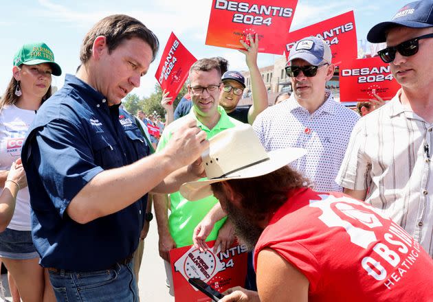 Florida Gov. Ron DeSantis, shown here at the Iowa State Fair, has been laying off the word 