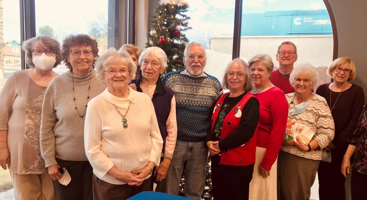 The Las Cruces Association of Educational Retirees met for their December luncheon and collected over 60 gift cards — $815 — for Project Link  which is a program providing services for homeless students in the Las Cruces Public Schools. Ann Gomez, second from the right, is holding the gift cards.