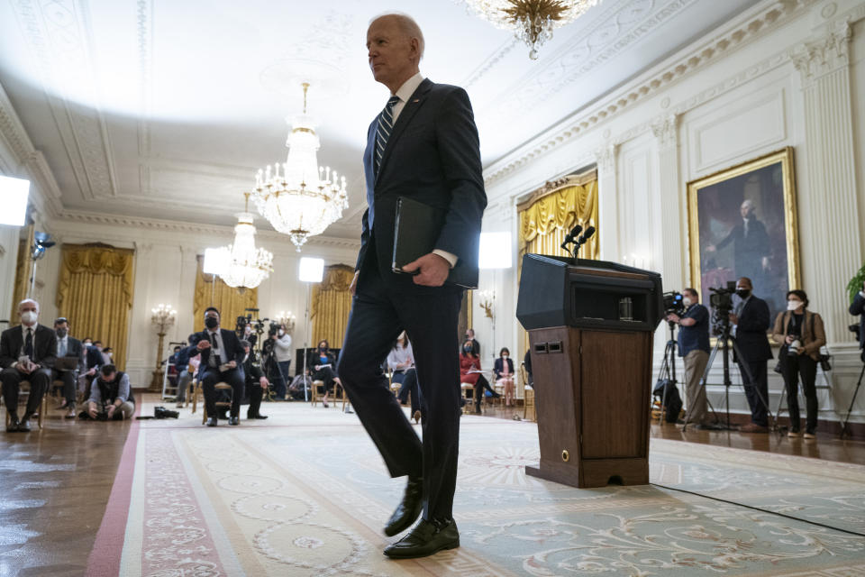 President Joe Biden walks off after a news conference in the East Room of the White House, Thursday, March 25, 2021, in Washington. (AP Photo/Evan Vucci)