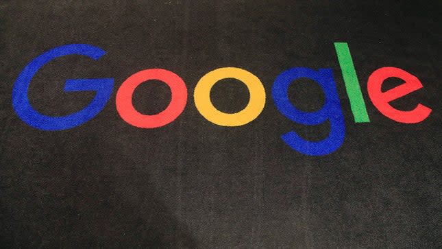 The Google logo is seen against a dark background