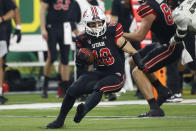 Utah wide receiver Britain Covey carries against Oregon during the first half of the Pac-12 Conference championship NCAA college football game Friday, Dec. 3, 2021, in Las Vegas. (AP Photo/Chase Stevens)