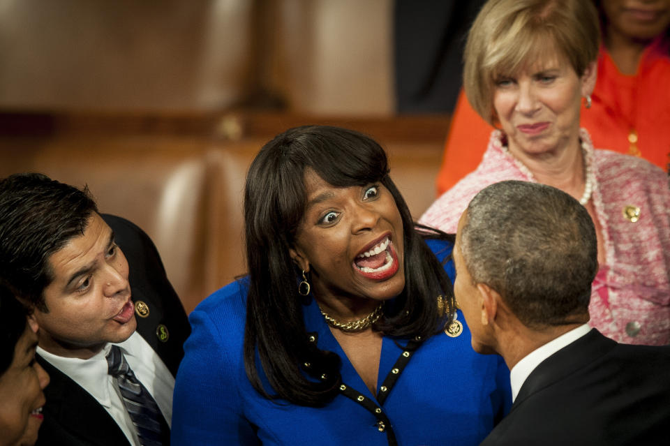 President Barack Obama, bottom right, is greeted by Rep. Terri Sewell (D-Ala.), center, as he arrives to deliver the State of the Union address to a joint session of Congress on Jan. 20, 2015.